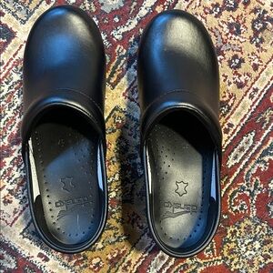 Dansko Black leather clogs